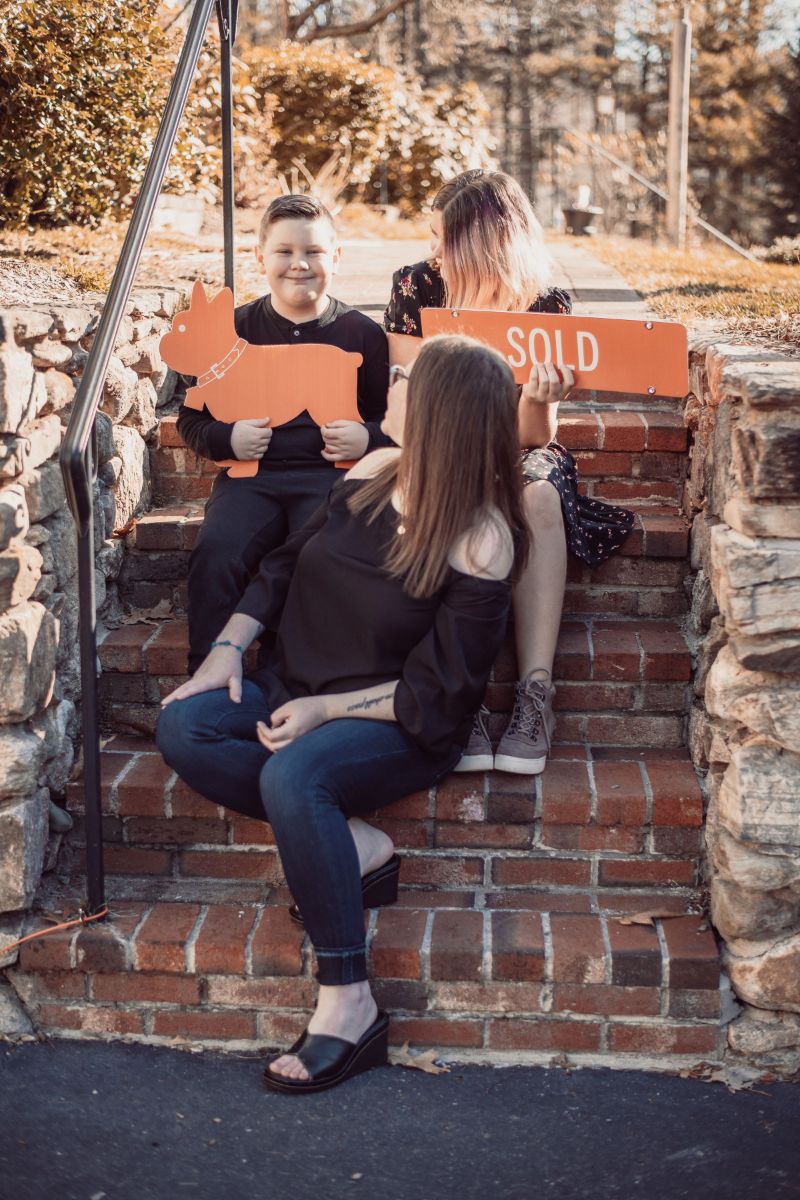 large kitchen with center island surrounded by bar stools